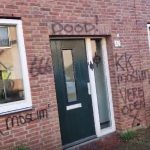 Huis moslim beklad met anti- islamleuzen